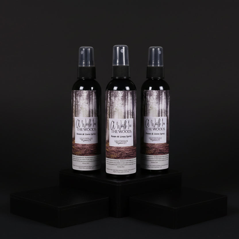 room spray bottles on wooden table