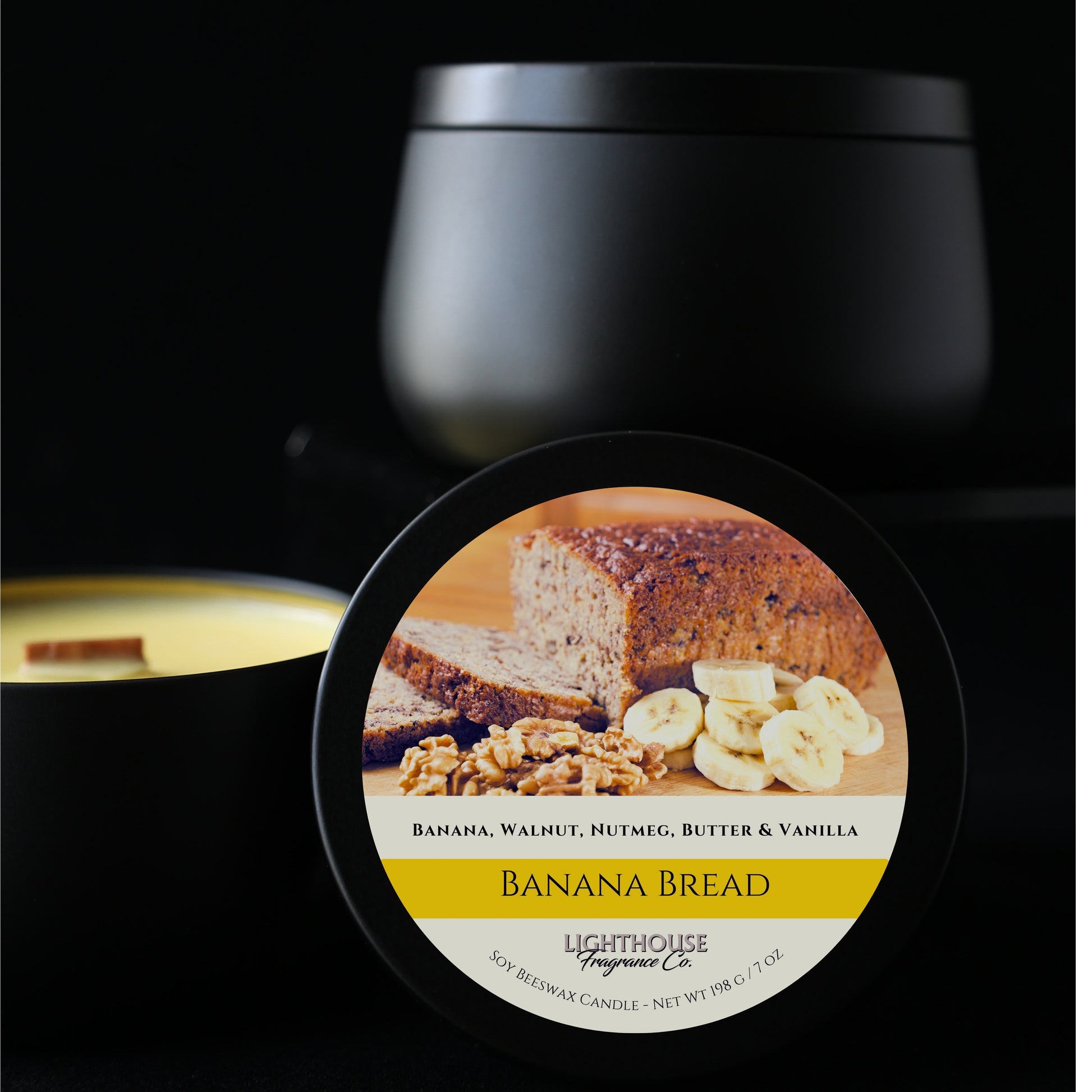 Banana Bread scented candle with a black container on a dark background