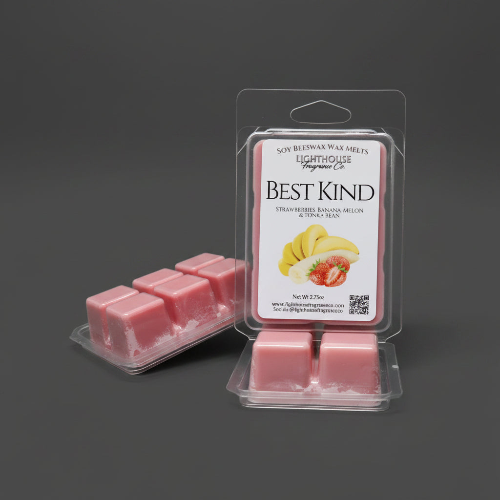 Pink wax melts in a clear packaging with a visible label on a gray surface