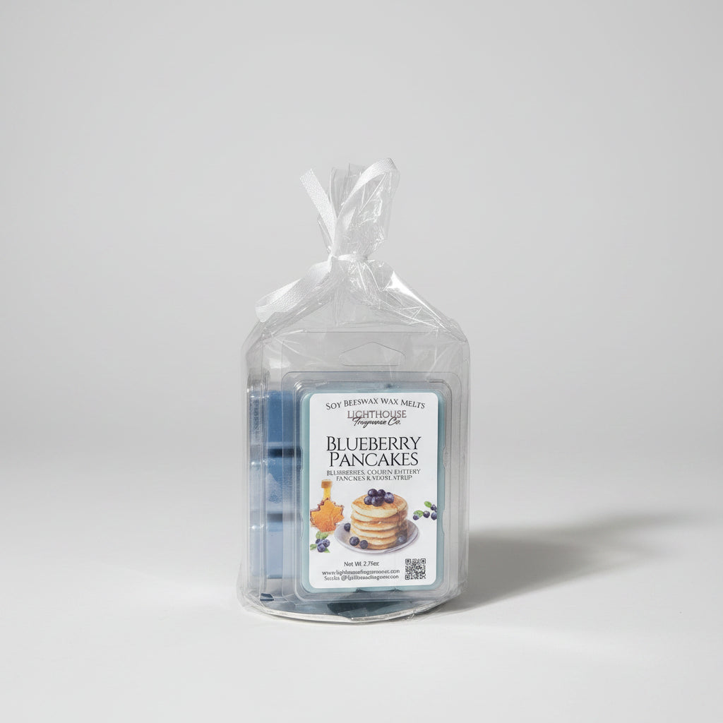 A packaged set of blueberry pancake scented wax melts , wrapped in clear cellophane with a white ribbon