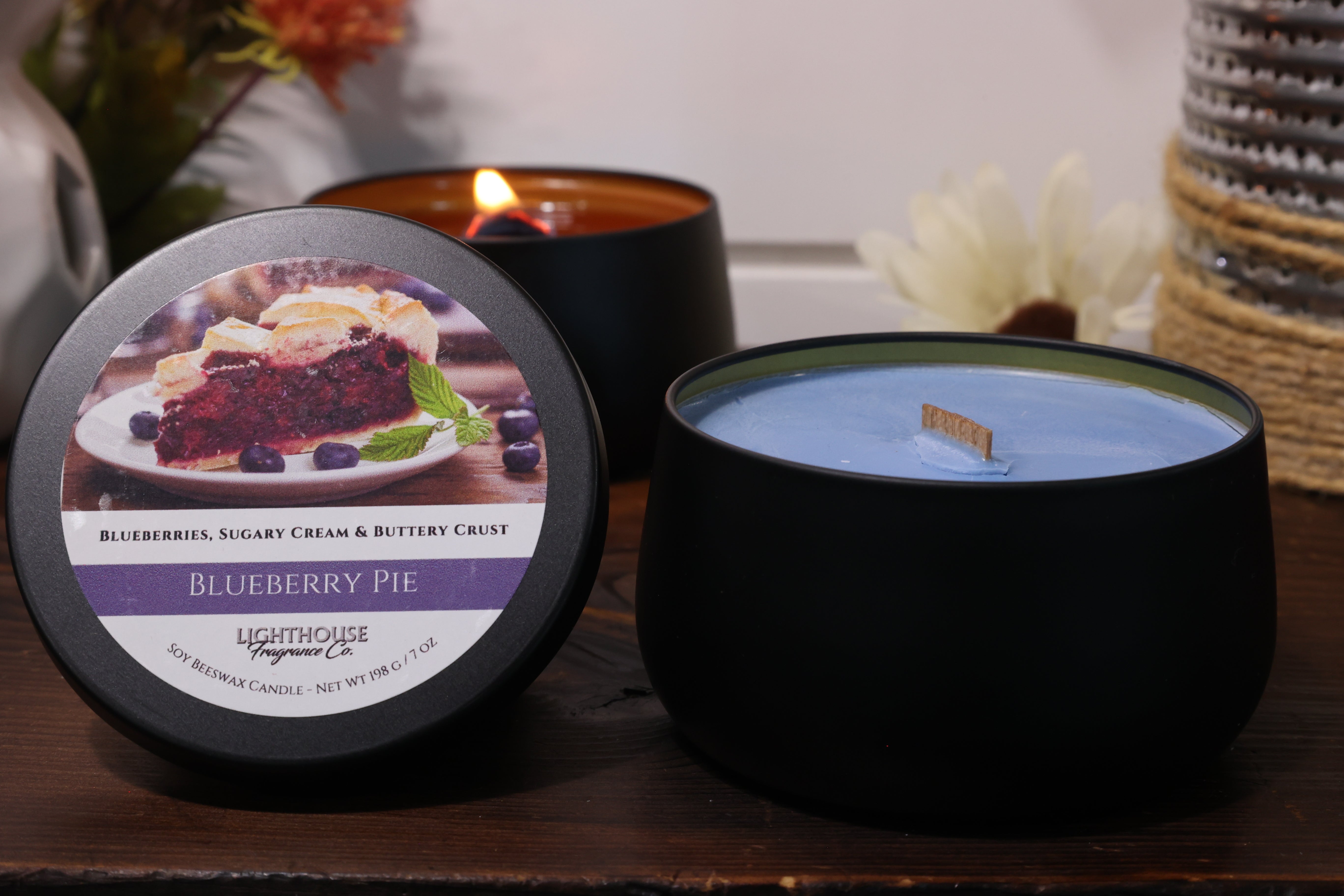 Candle tin on a wooden table