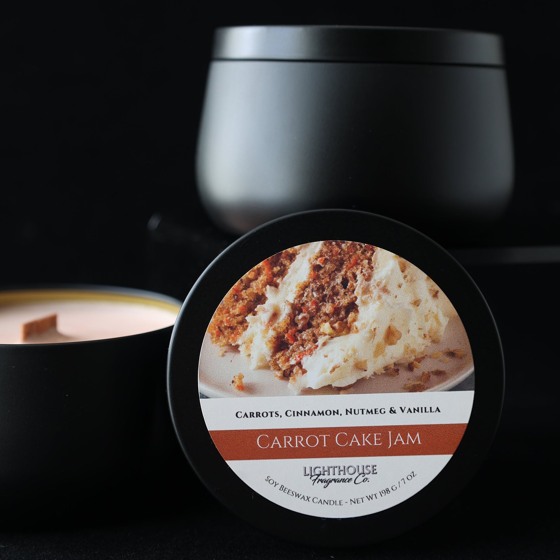 Carrot cake jar candle with a close-up of the cake on a black background