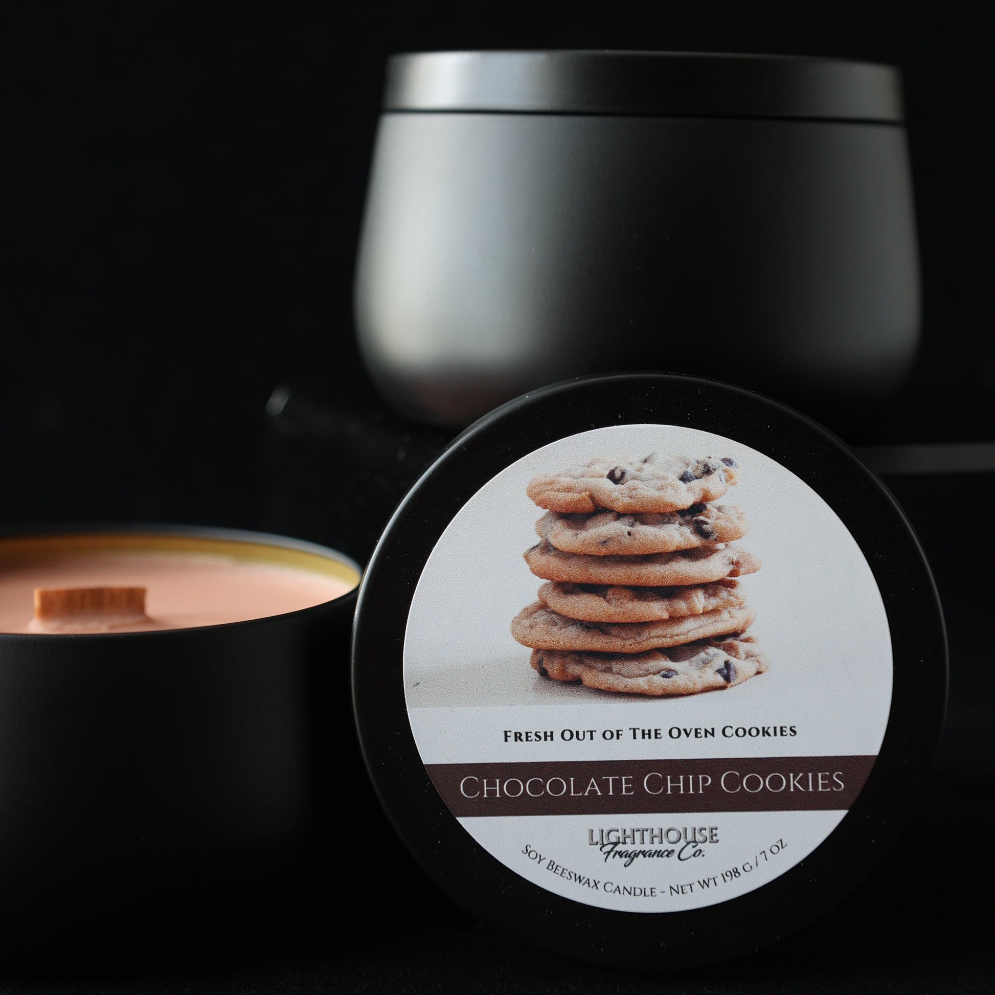 Chocolate Chip Cookies Candle in a black tin against a black background