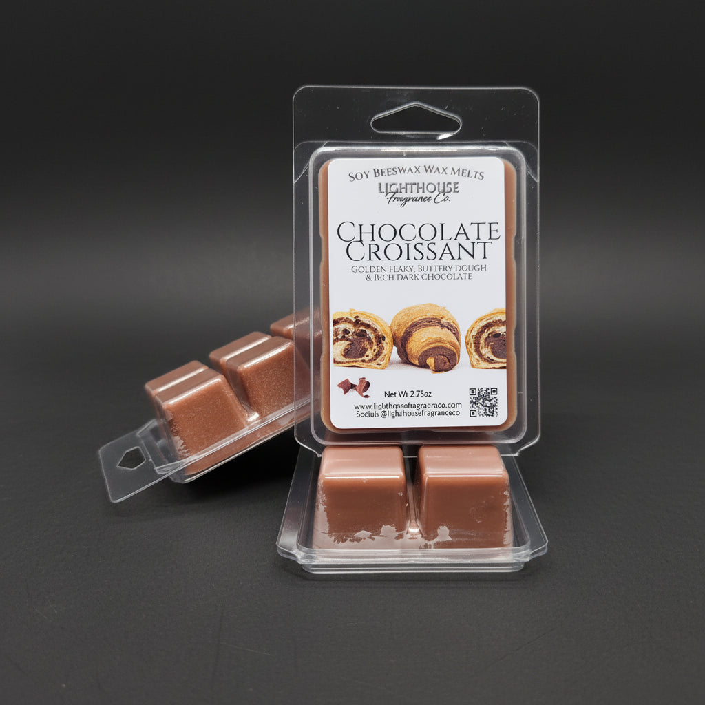 Packaged chocolate croissant-scented wax melts on a light gray surface - Newfoundland Made