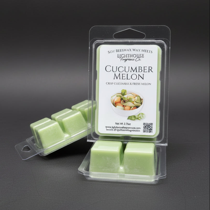 Cucumber melon wax melts in packaging on a gray surface