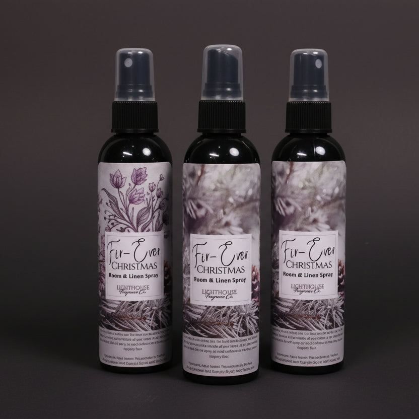 room spray bottles on wooden table