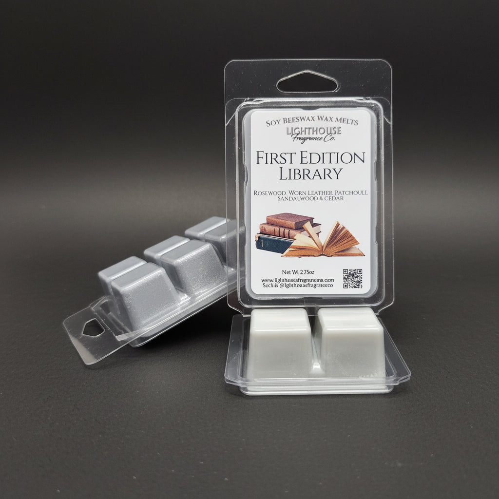Scented wax melts in a clear packaging with a label on a gray surface