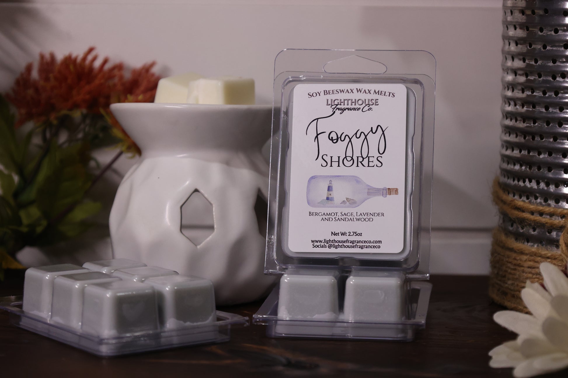 Foggy Shores wax melts packaging with a wax warmer on a decorative surface.