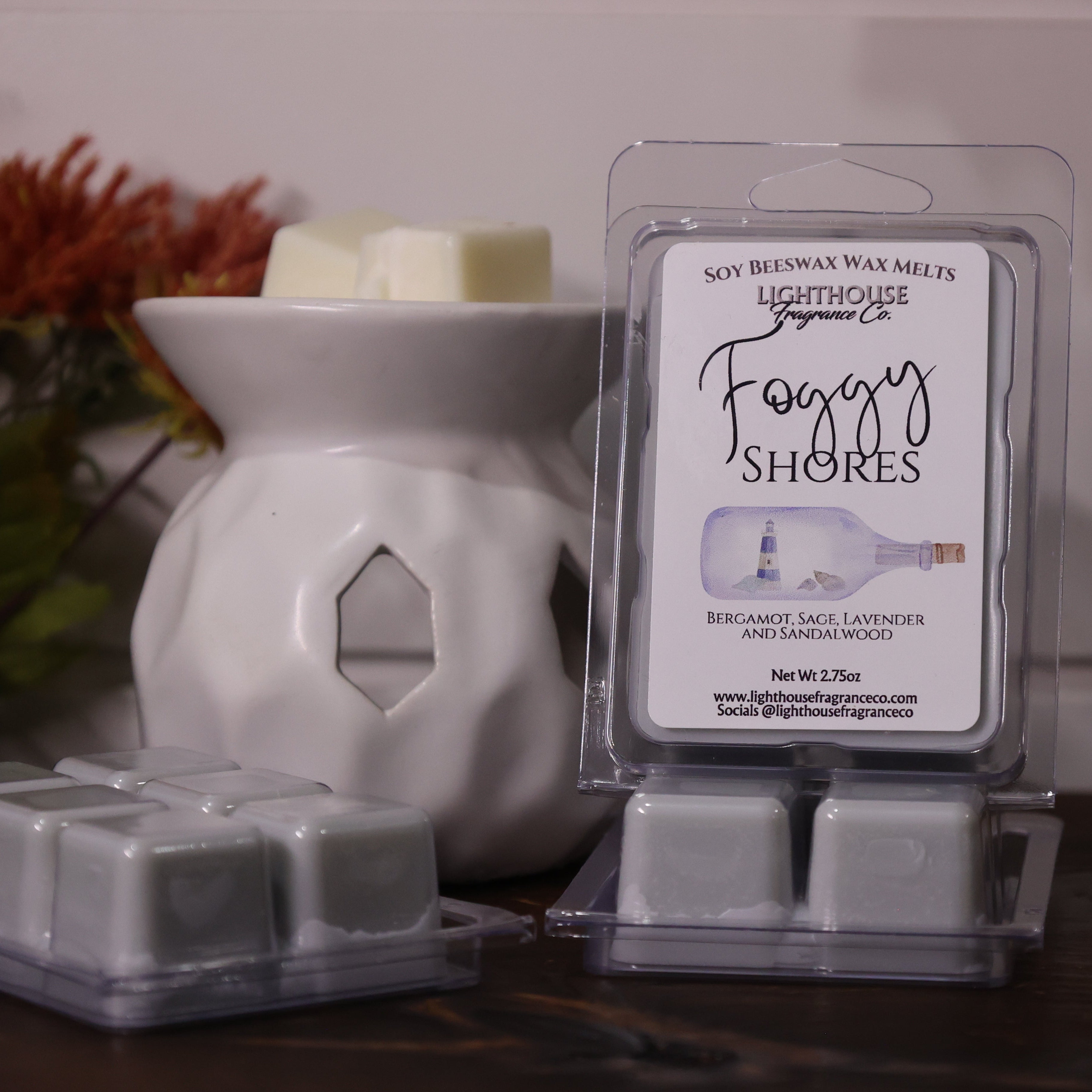 Foggy Shores wax melts packaging with a wax warmer on a decorative surface.