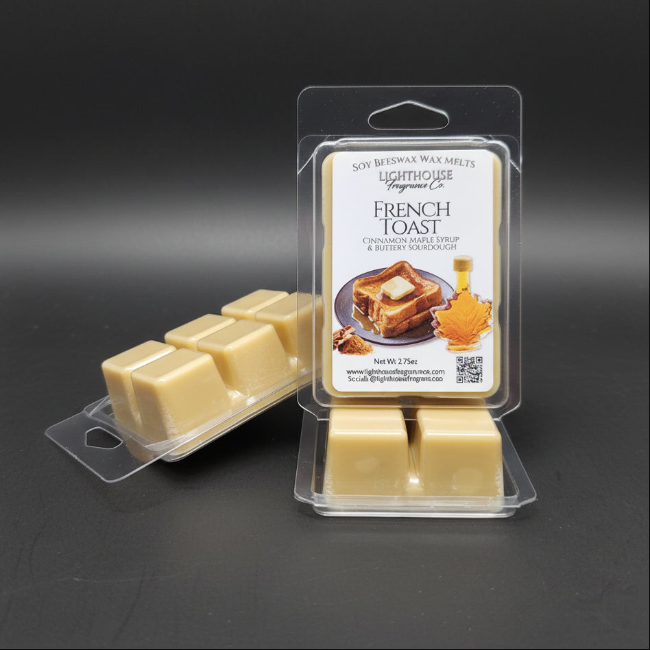 Packaged soy beeswax wax melts with 'French Toast' flavor on a gray surface