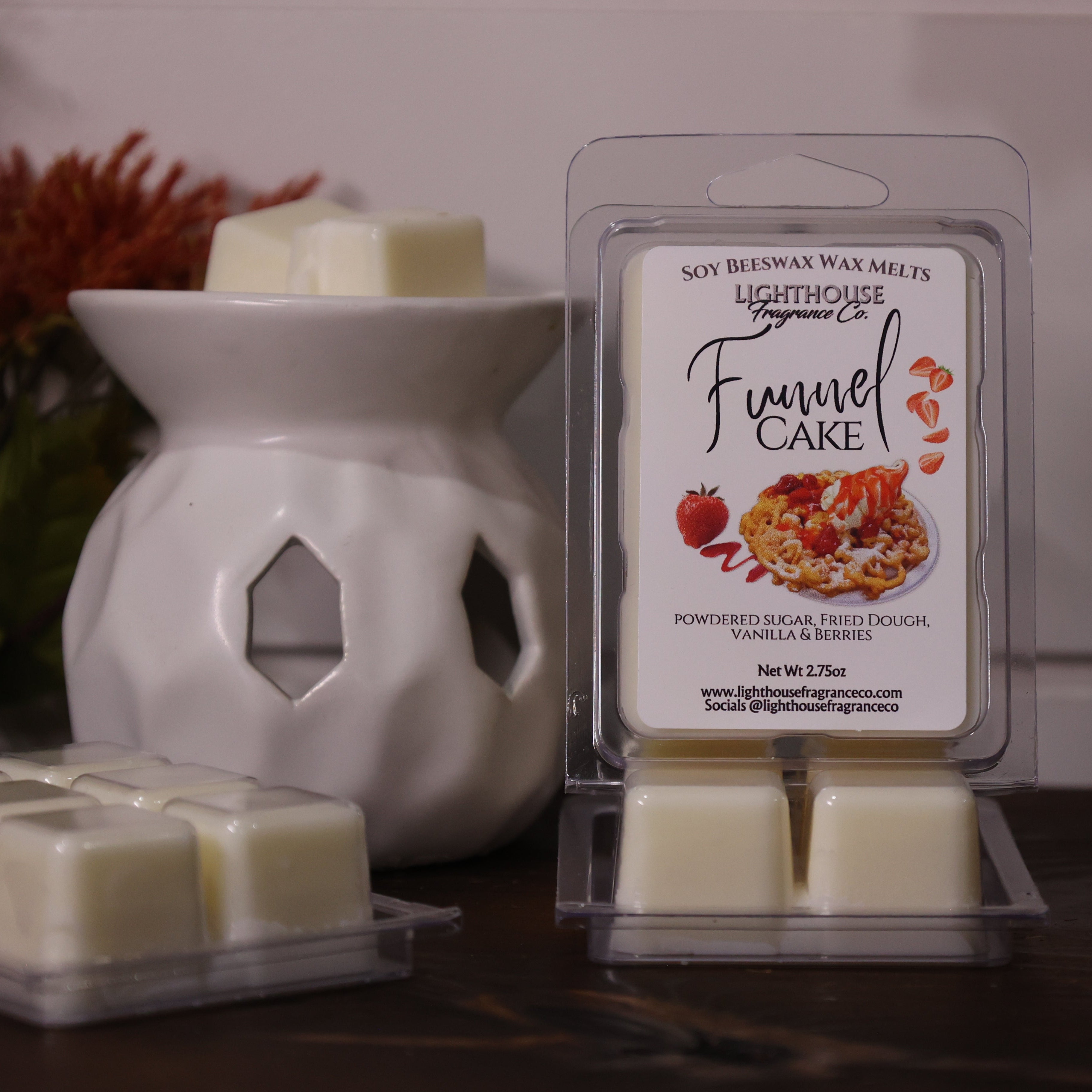 Packaged Funnel Cake scented wax melts with a wax warmer on a wooden surface.