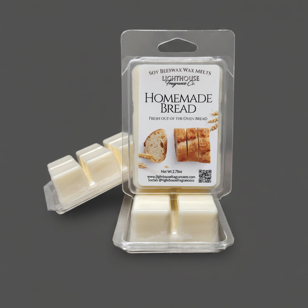 Packaged wax melts with 'Homemade Bread' flavor on a gray surface