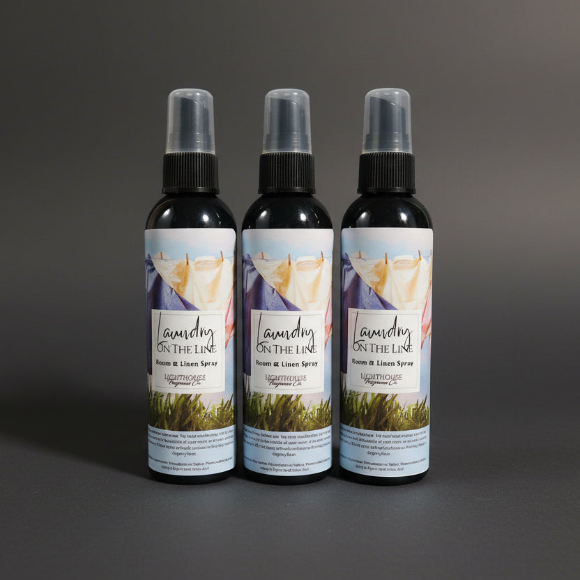 bottle of room spray with a dark grey background