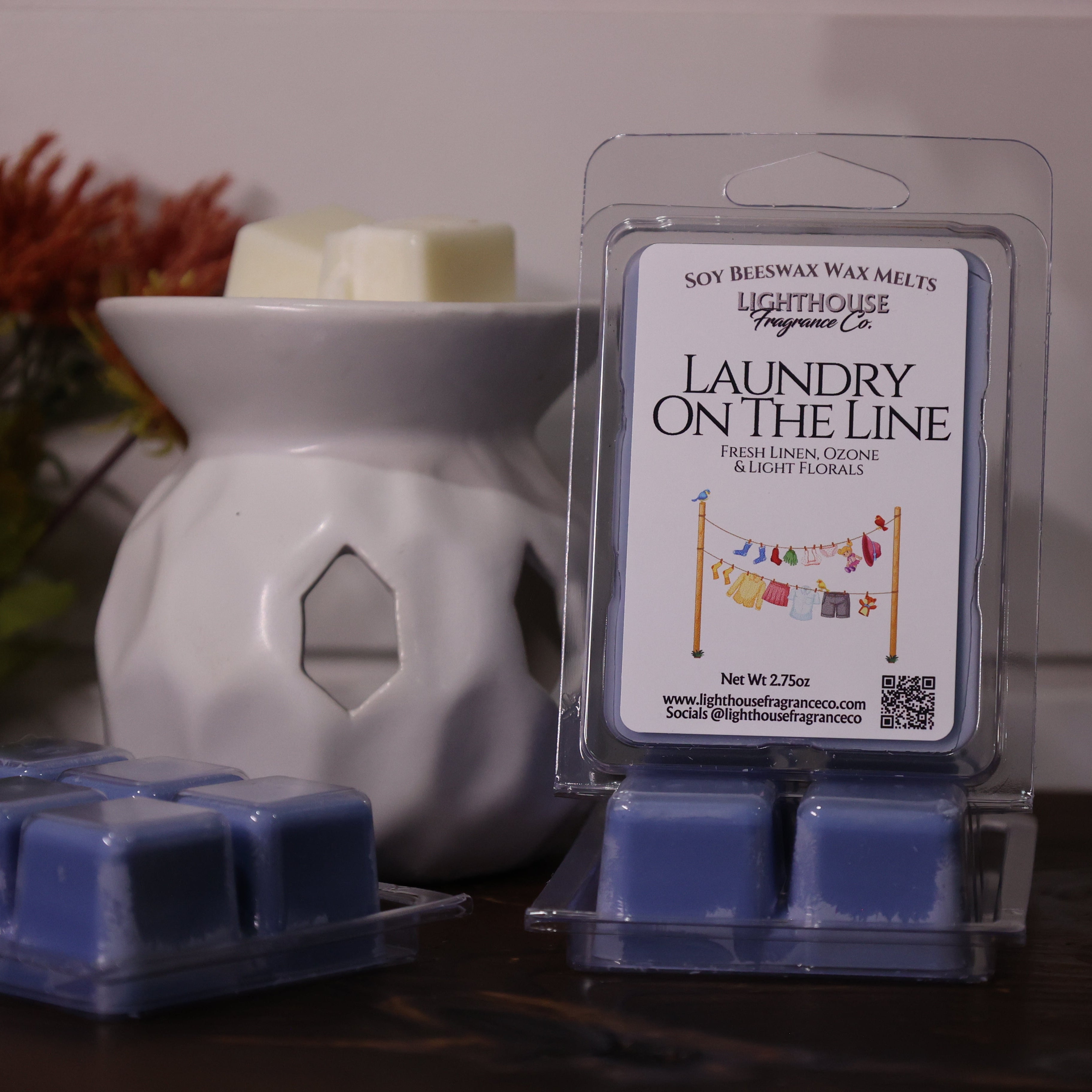 Packaged soy wax melts with a wax melter on a wooden surface