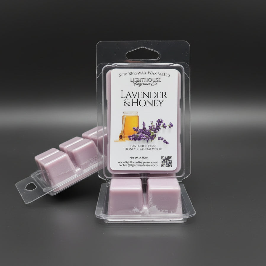 Packaged lavender and honey wax melts on a metallic surface