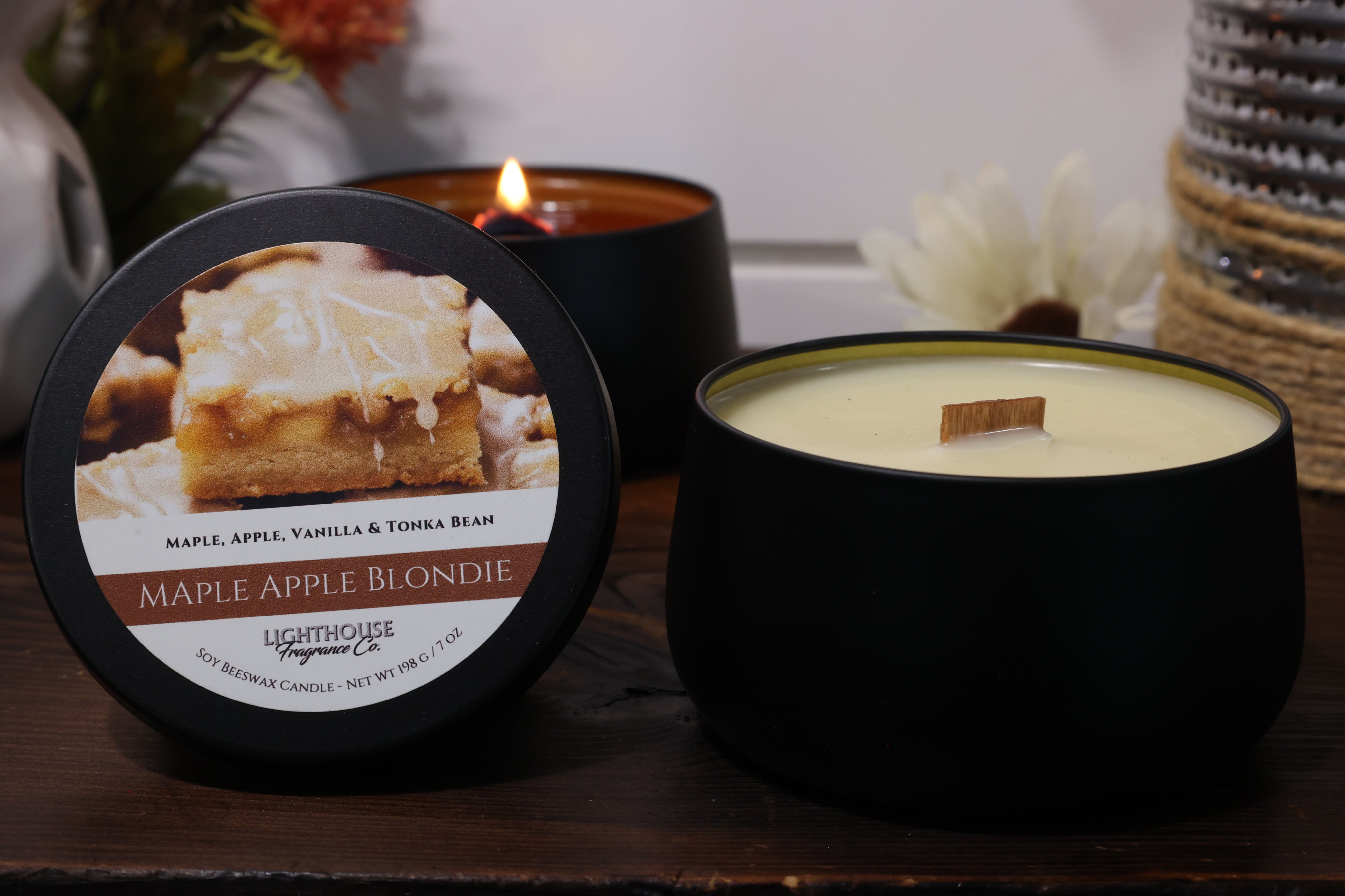 Maple Apple Blondie candle with packaging on a wooden surface