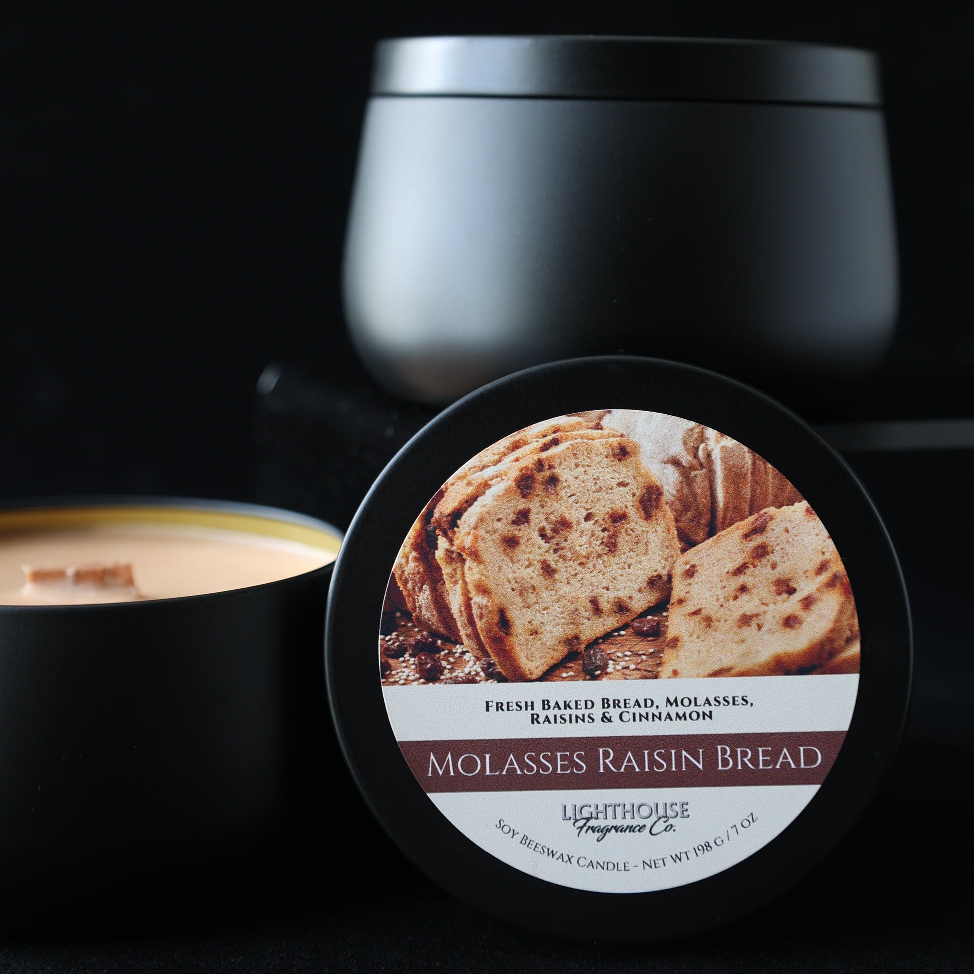 Molasses Raisin Bread Candle in a black tin