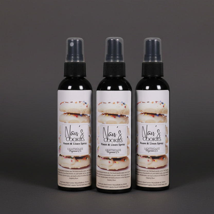 room spray bottles on wooden table