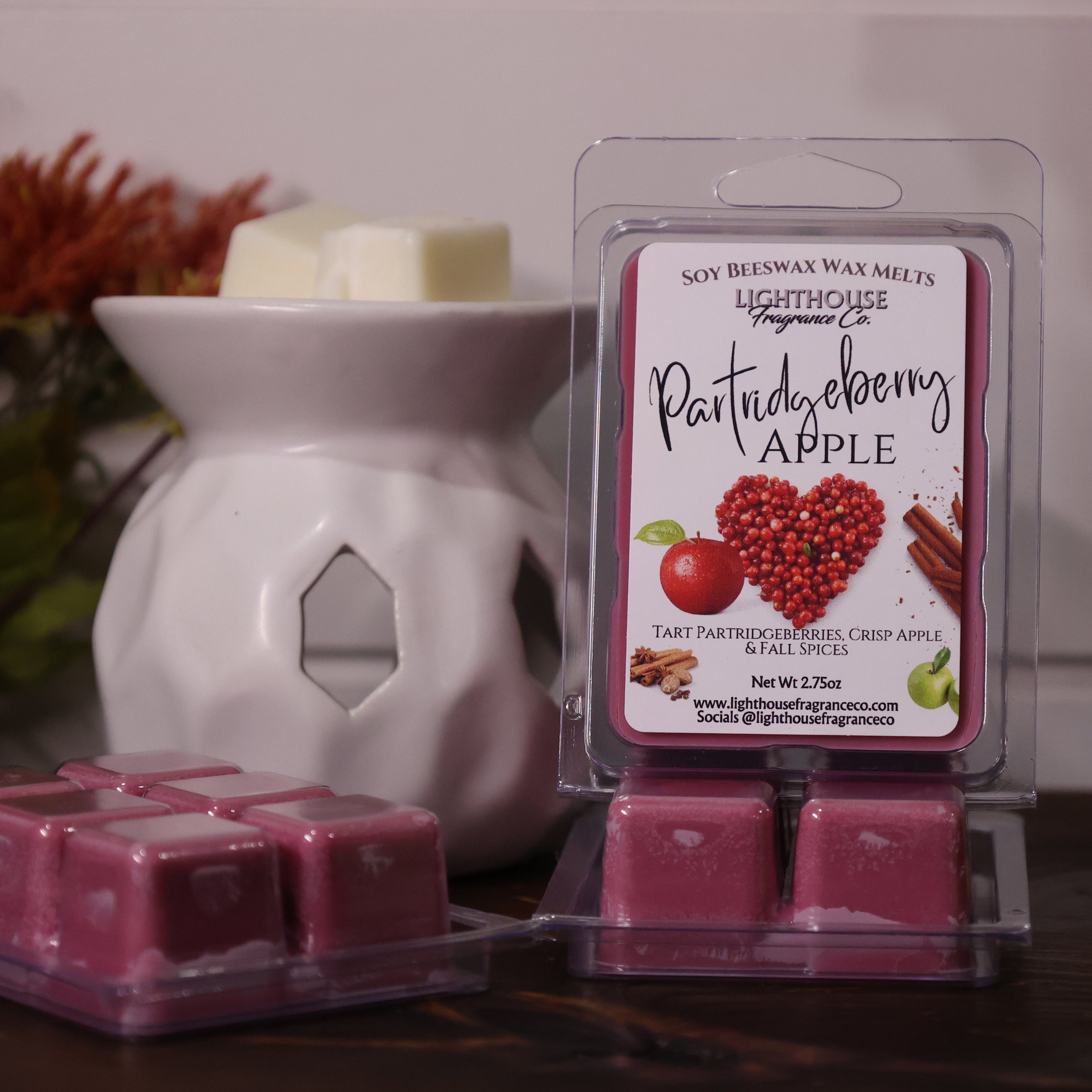 Partridgeberry Apple wax melts with a  white wax warmer.