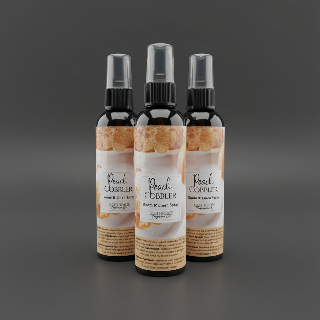 room spray bottles on a dark grey background