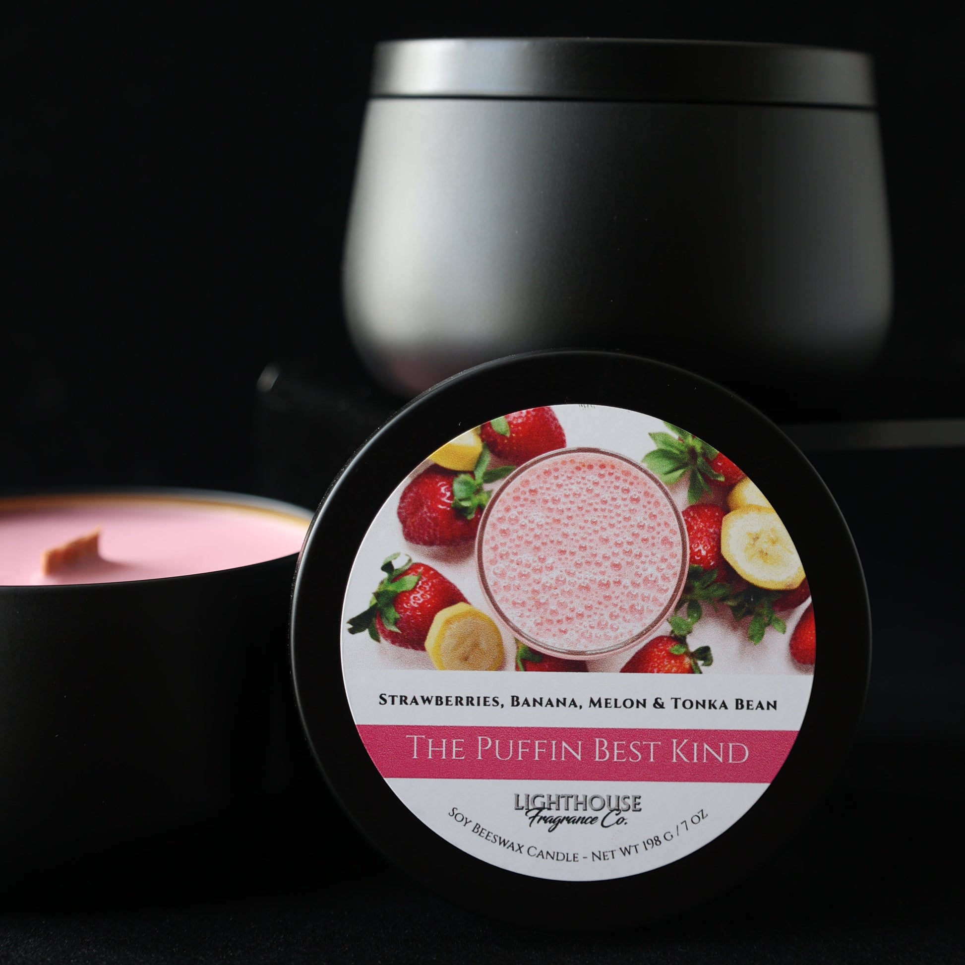 Candle in a black tin called puffin best kind