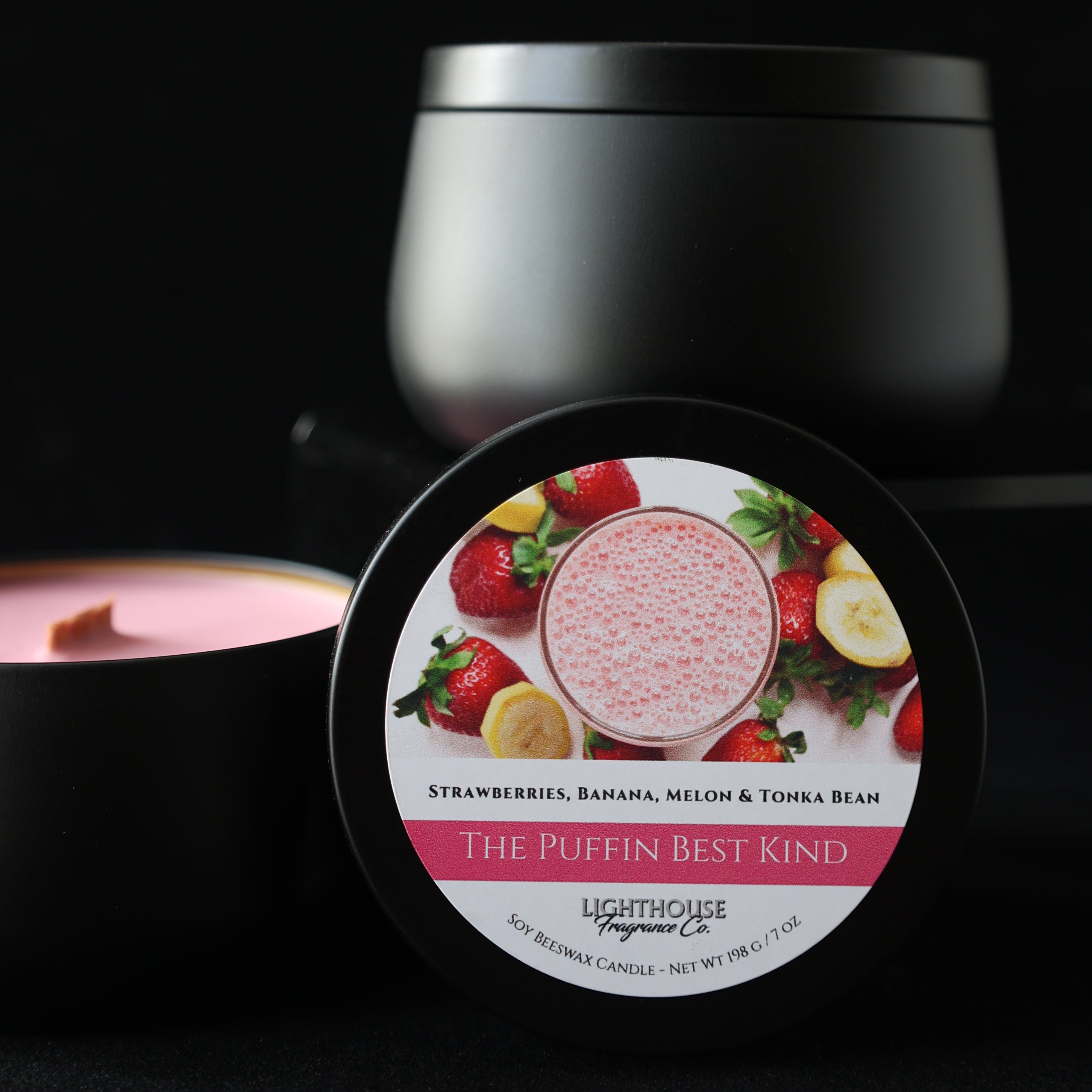 Candle in a black tin called puffin best kind