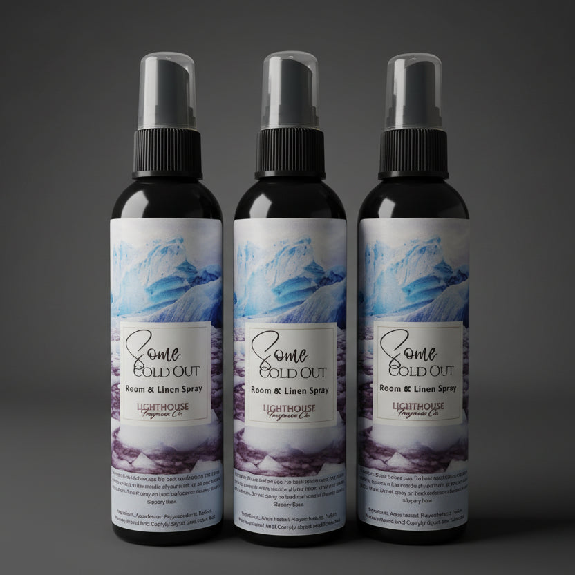 bottle of room spray with a dark grey background