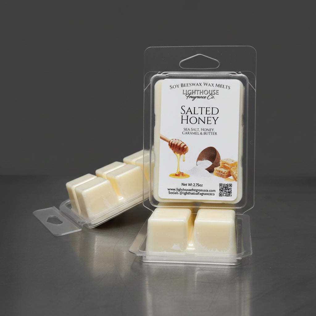 Packaged salted honey wax melts on a gray surface