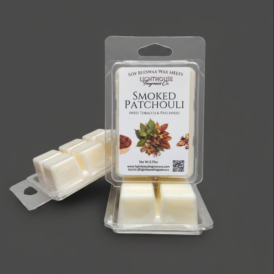 Packaged Smoked Patchouli wax melts on a gray surface