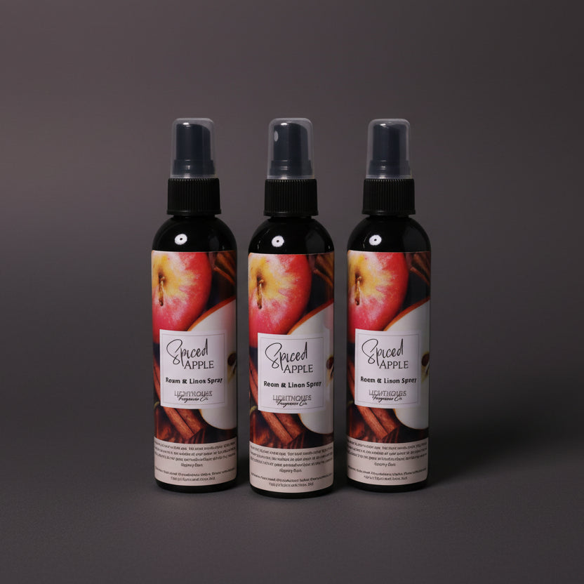 room spray bottles on wooden table