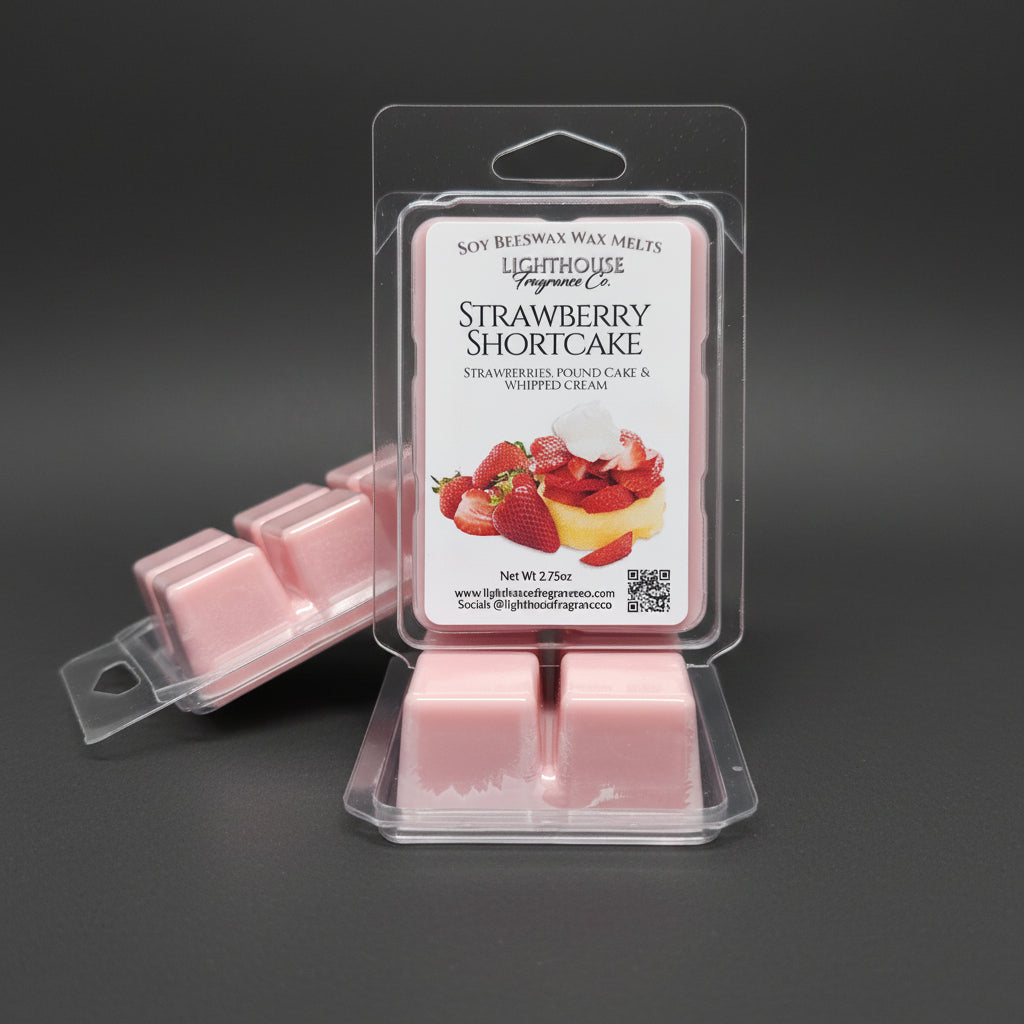 Strawberry Shortcake wax melts in packaging on a light gray background.  Produced in a small batch in a small town in Newfoundland