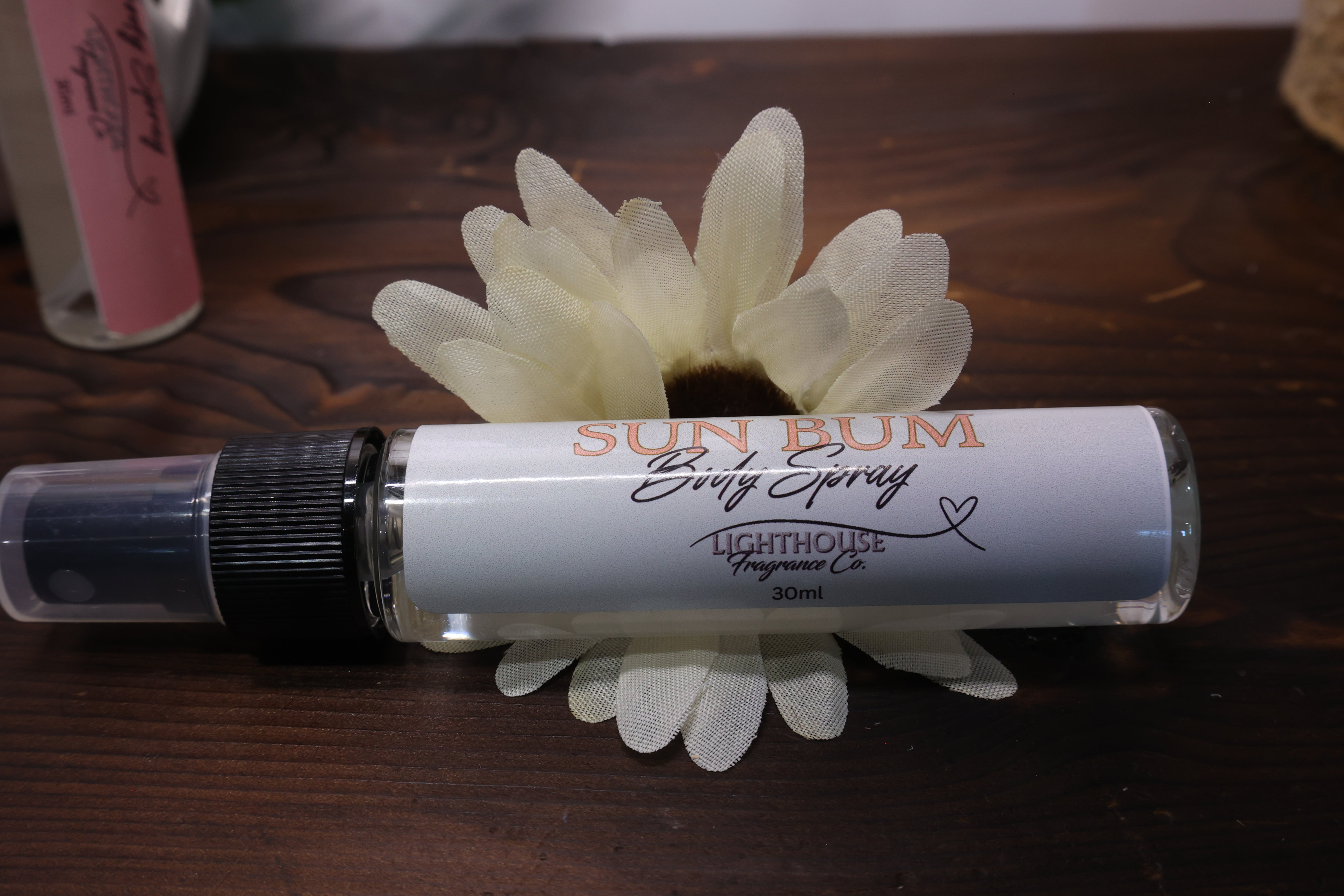 perfume on a wood table