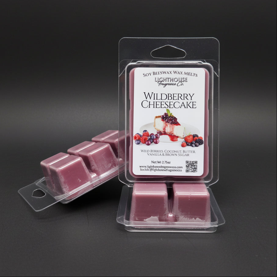 Packs of Wildberry Cheesecake wax melts on a gray surface